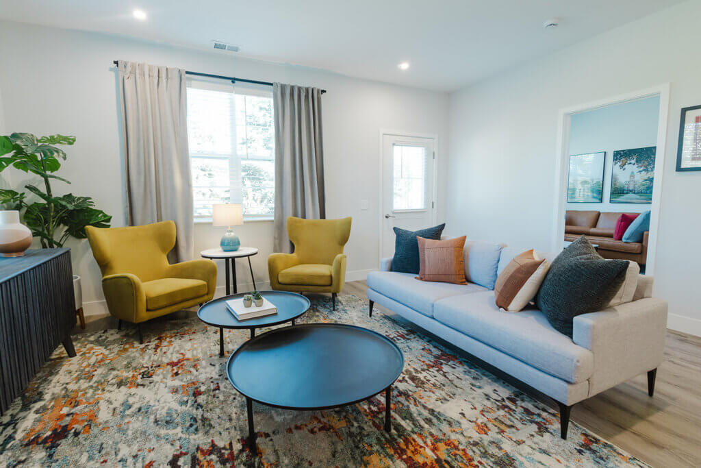 Interior shot of the living room in one style of cottage at Verena at Hilliard